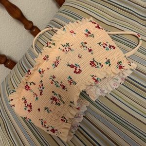 Bathing suit top says M but fits like small